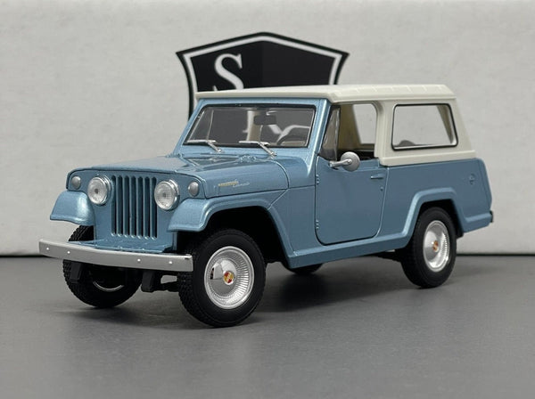 Jeep Jeepster Commando - Welly 1:24 Diecast