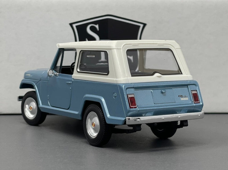 Jeep Jeepster Commando - Welly 1:24 Diecast