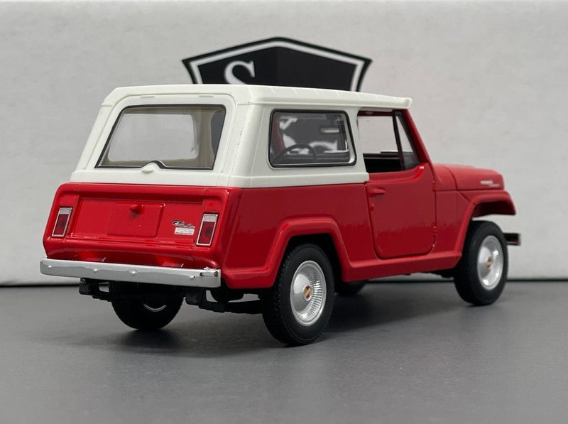 Jeep Jeepster Commando - Welly 1:24 Diecast