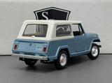 Jeep Jeepster Commando - Welly 1:24 Diecast